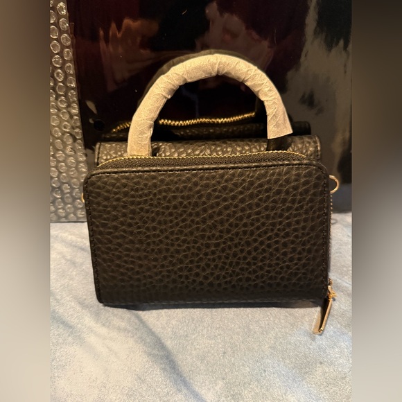 New vegan leather black mini top handle bag with a gold tone lock closure - Picture 2 of 3